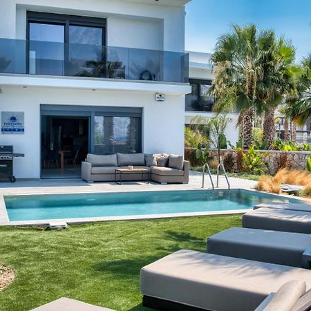 Penélope Beachfront Villa Kremastí Esterno foto
