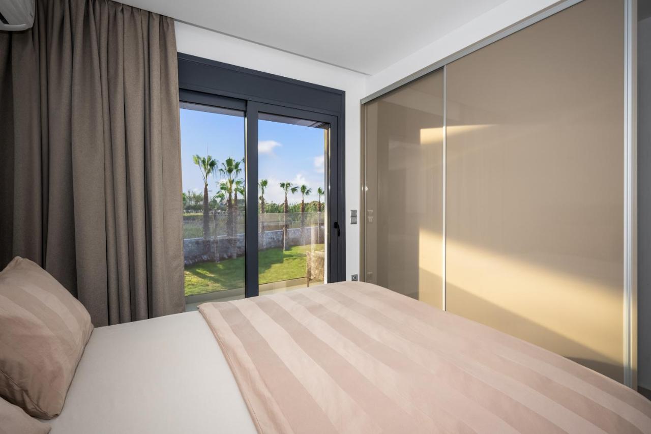 Penélope Beachfront Villa Kremastí Esterno foto