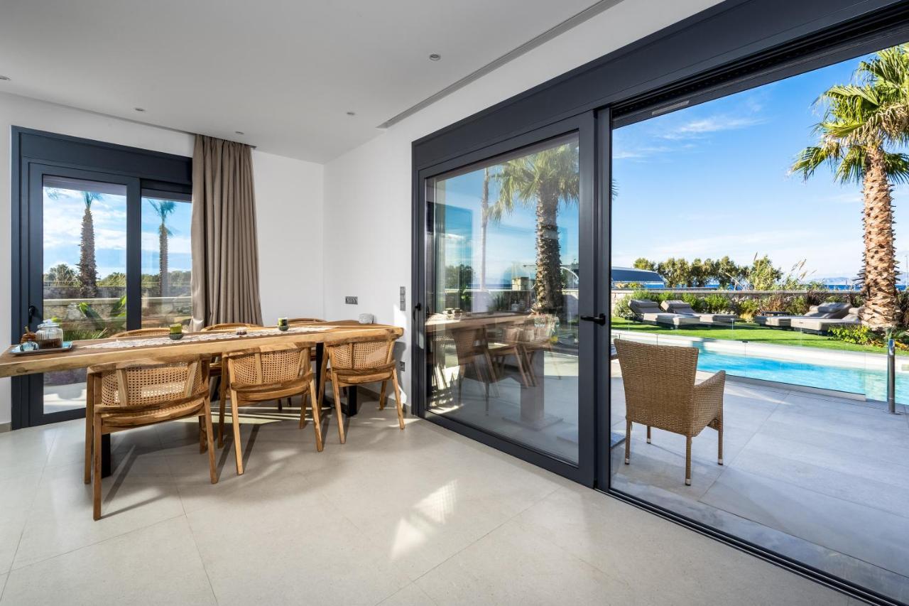 Penélope Beachfront Villa Kremastí Esterno foto