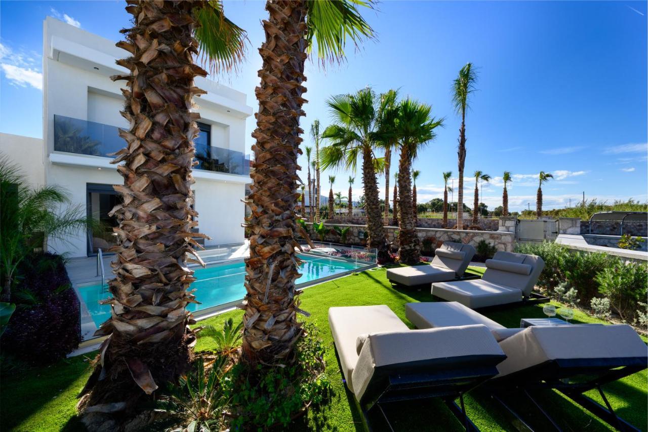 Penélope Beachfront Villa Kremastí Esterno foto