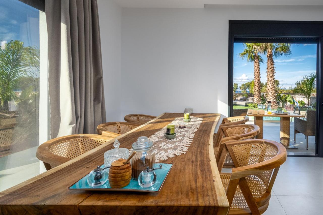 Penélope Beachfront Villa Kremastí Esterno foto