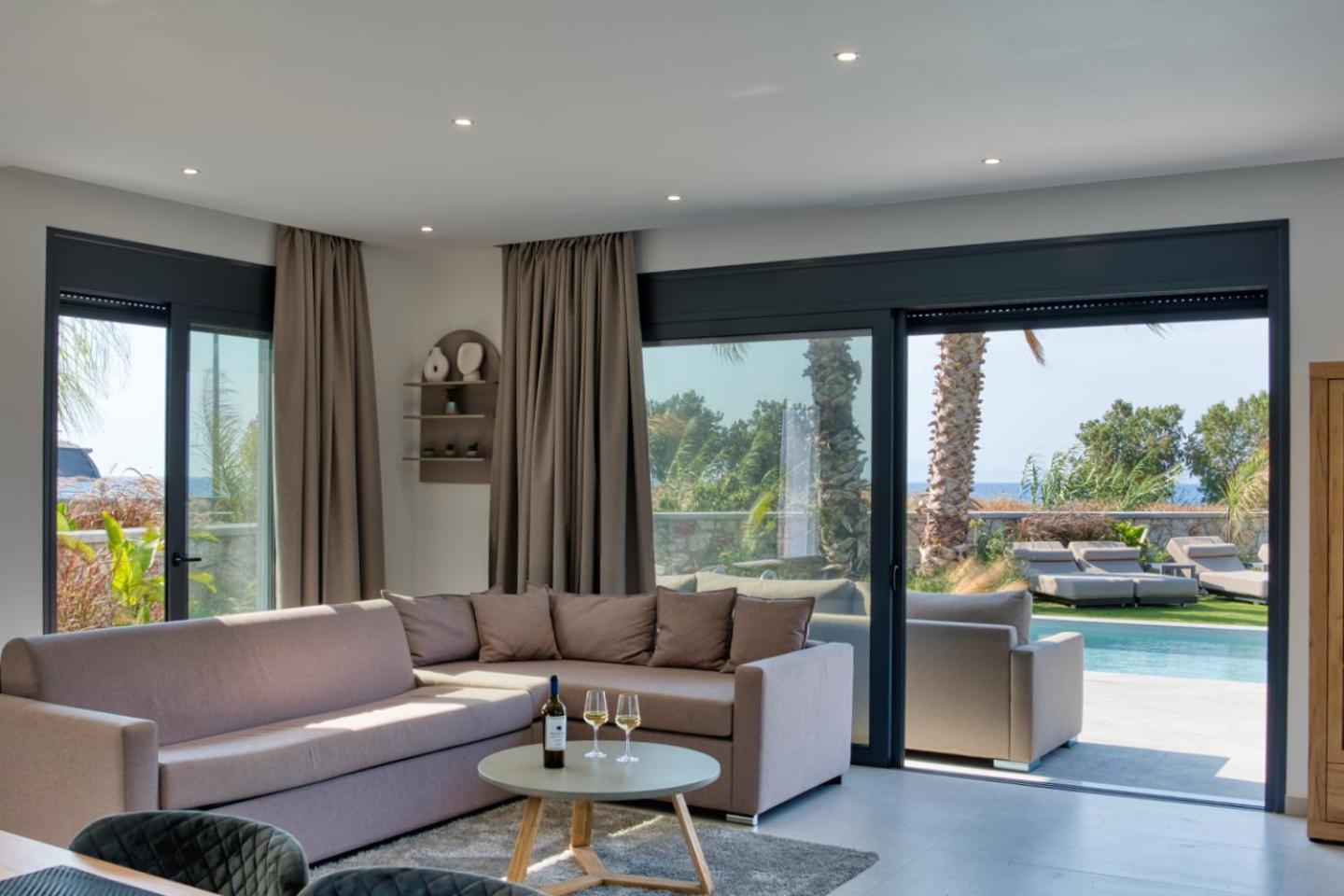 Penélope Beachfront Villa Kremastí Esterno foto