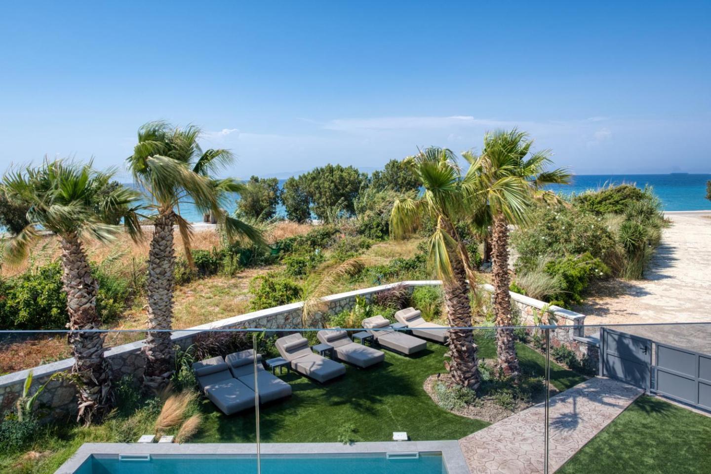 Penélope Beachfront Villa Kremastí Esterno foto